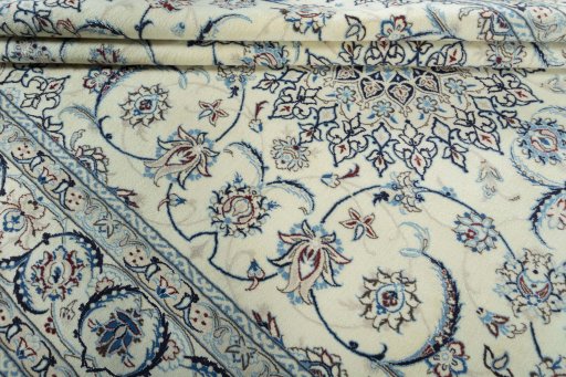 Close-up detail of 2000s Nain rug from Iran / Persia showing Wool weave