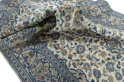 Surface texture of 2000s Kashan rug with natural Wool and intricate pattern