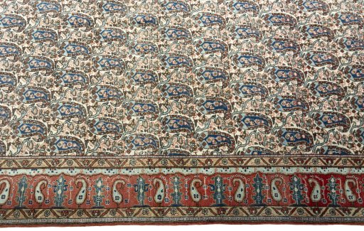 Close-up detail of 1950s Ghom rug from Iran / Persia showing Wool weave