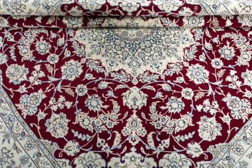 Close-up detail of New Nain rug from Iran / Persia showing Wool weave