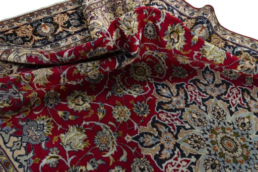 Surface texture of 2000s Najafabad rug with natural Wool and intricate pattern