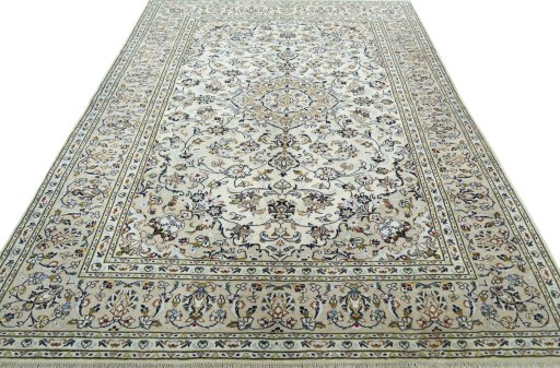 Surface texture of 2000s Kashan rug with natural Wool and intricate pattern