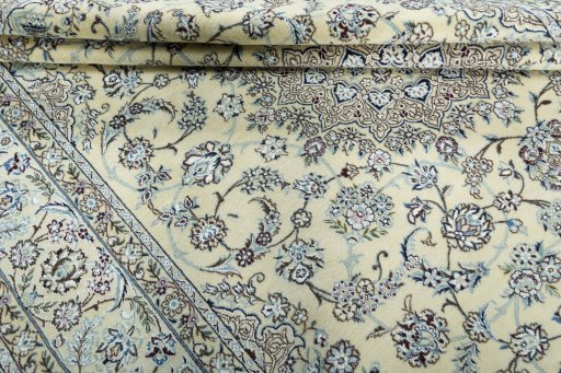 Close-up detail of 2000s Nain rug from Iran / Persia showing Wool weave