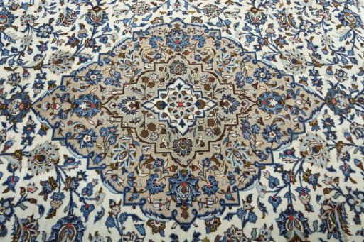Central medallion detail of 2000s Kashan rug from Iran / Persia