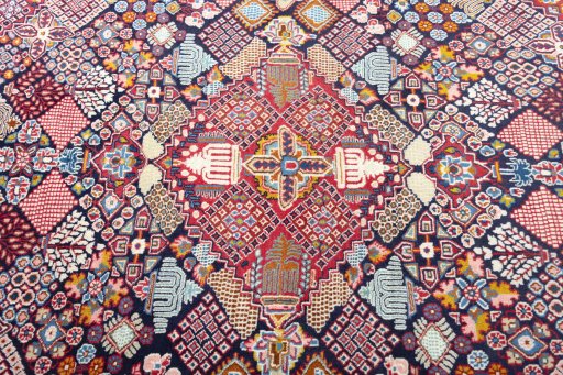 Central medallion detail of 2000s Kashan rug from Iran / Persia