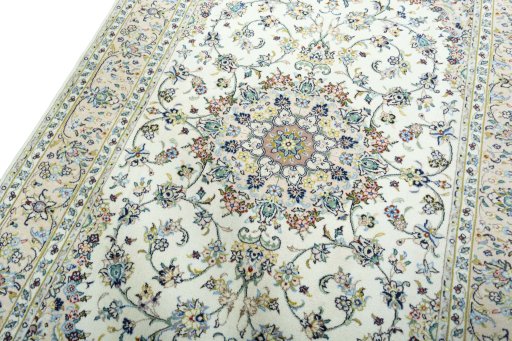 Backside of handmade New Kashan rug showing knot structure and weave density