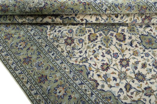 Close-up detail of 2000s Kashan rug from Iran / Persia showing Wool weave