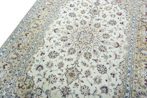Backside of handmade 2000s Kashan rug showing knot structure and weave density