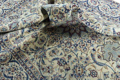 Surface texture of 2000s Nain rug with natural Wool and intricate pattern