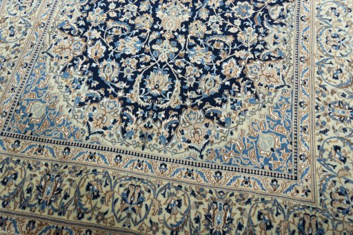 Close-up detail of 2000s Nain rug from Iran / Persia showing Wool weave