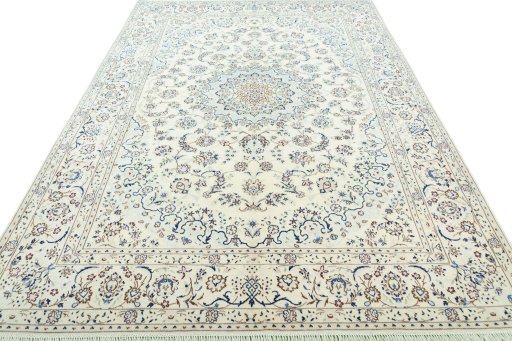 Surface texture of 2000s Nain rug with natural Wool and intricate pattern