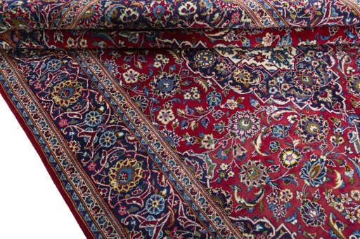 Close-up detail of New Kashan rug from Iran / Persia showing Wool weave