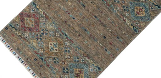 Backside of handmade New Samarkand rug showing knot structure and weave density