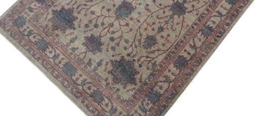 Backside of handmade New Farahan rug showing knot structure and weave density