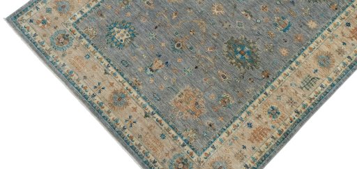 Backside of handmade New Farahan rug showing knot structure and weave density