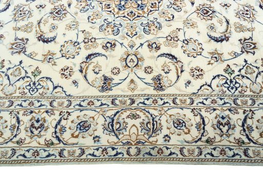 Corner detail of 2000s Nain rug showing border pattern and Wool pile