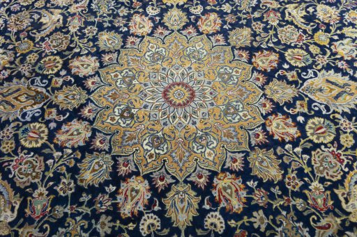Central medallion detail of 2000s Kashan rug from Iran / Persia