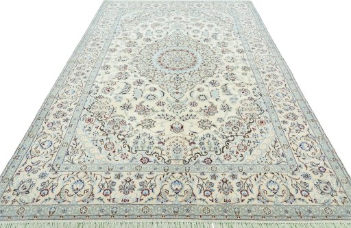 Surface texture of 2000s Nain rug with natural Wool and intricate pattern