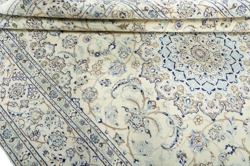 Close-up detail of 2000s Nain rug from Iran / Persia showing Wool weave