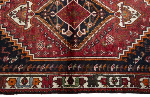 Full view of 2000s Shiraz rug from Iran / Persia, 163 × 116 cm in Red tones