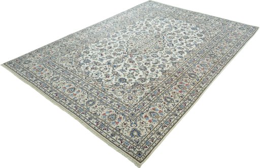 Corner detail of 2000s Kashan rug showing border pattern and Wool pile
