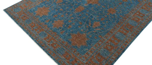 Backside of handmade New Farahan rug showing knot structure and weave density