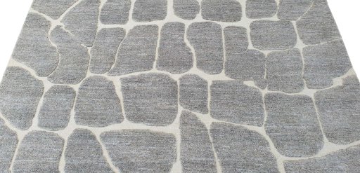 Backside of handmade New Morocco rug showing knot structure and weave density