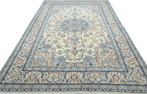 Surface texture of 2000s Nain rug with natural Wool and intricate pattern