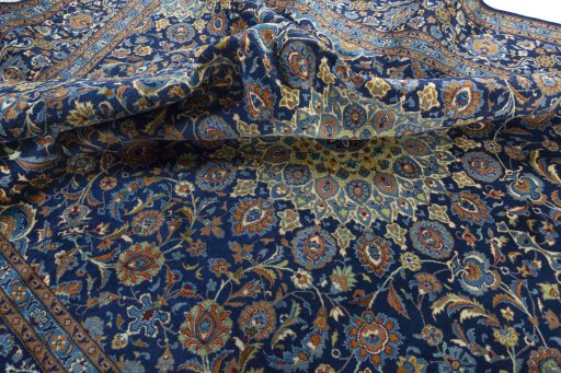Surface texture of 2000s Kashmar rug with natural Wool and intricate pattern