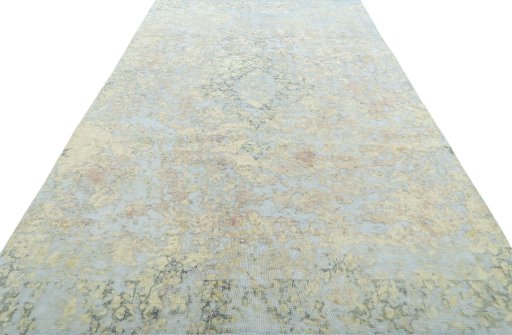 Surface texture of 1950s Vintage rug with natural Wool and intricate pattern