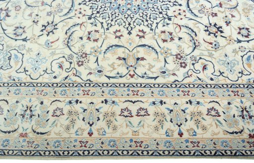 Corner detail of 2000s Nain rug showing border pattern and Wool pile