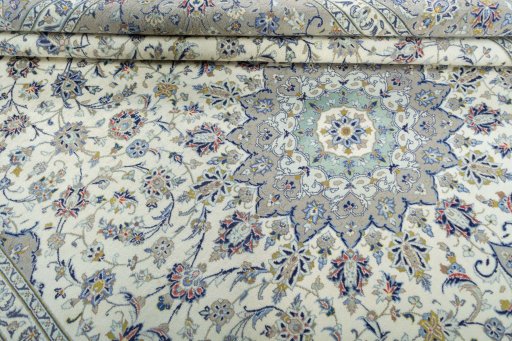 Close-up detail of 2000s Kashan rug from Iran / Persia showing Wool weave