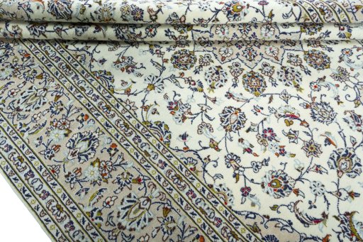 Close-up detail of 2000s Kashan rug from Iran / Persia showing Wool weave