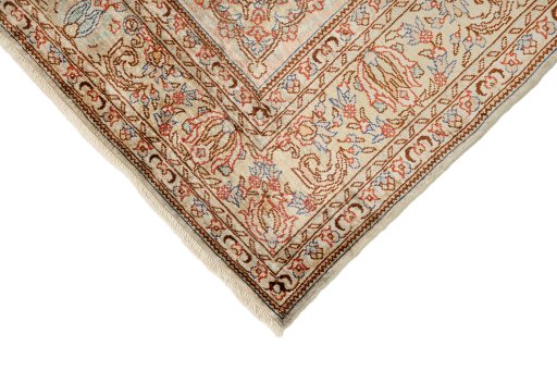 Backside of handmade 1920s Istanbul Silk rug showing knot structure and weave density