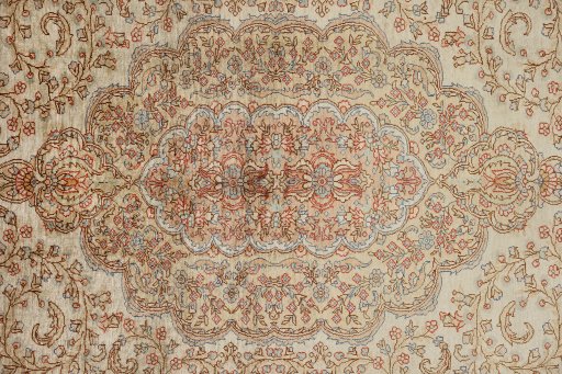 Central medallion detail of 1920s Istanbul Silk rug from Turkey