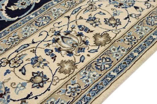 Central medallion detail of 1990s Nain Silk rug from Iran / Persia