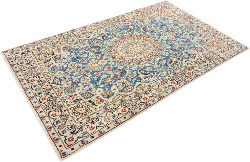 Corner detail of 1990s Nain Silk rug showing border pattern and Wool pile