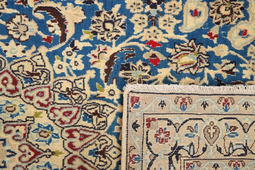 Close-up detail of 1990s Nain Silk rug from Iran / Persia showing Wool weave