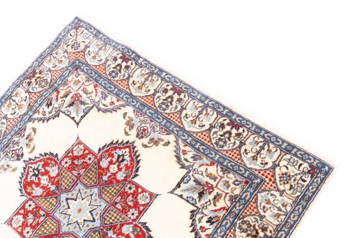 Surface texture of 2002s Nain Silk rug with natural Wool and intricate pattern