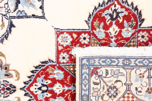Close-up detail of 2002s Nain Silk rug from Iran / Persia showing Wool weave