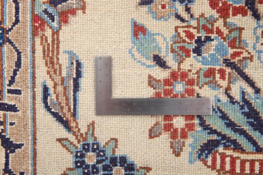 Corner detail of 2000s Nain Silk rug showing border pattern and Wool pile
