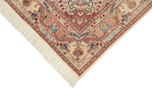 Backside of handmade New Tabriz Silk rug showing knot structure and weave density