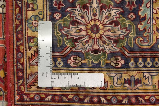 Corner detail of 1960s Tabriz Silk rug showing border pattern and Silk pile