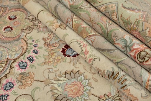 Corner detail of New Tabriz Silk rug showing border pattern and Wool pile