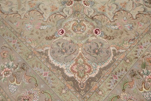 Central medallion detail of New Tabriz Silk rug from Iran / Persia