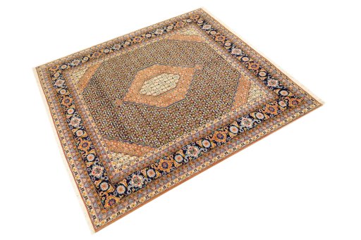 Corner detail of 1990s Tabriz Silk rug showing border pattern and Wool pile