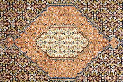 Central medallion detail of 1990s Tabriz Silk rug from Iran / Persia