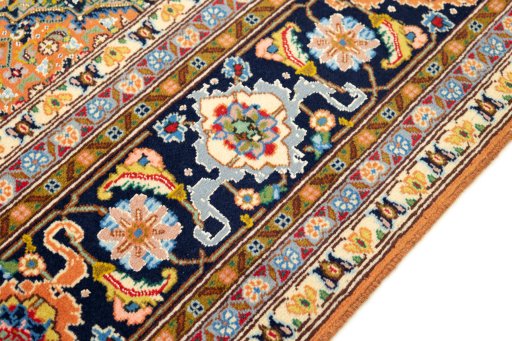 Close-up detail of 1990s Tabriz Silk rug from Iran / Persia showing Wool weave