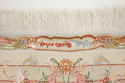 Close-up detail of 1990s Tabriz Silk rug from Iran / Persia showing Wool weave