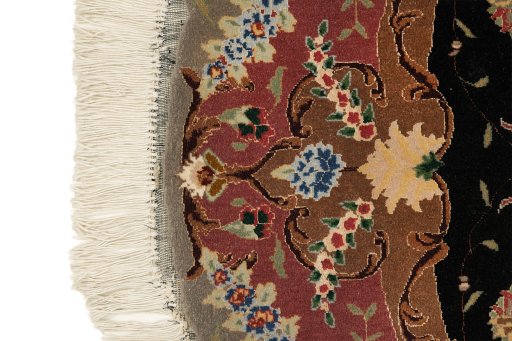 Central medallion detail of New Tabriz Silk rug from Iran / Persia